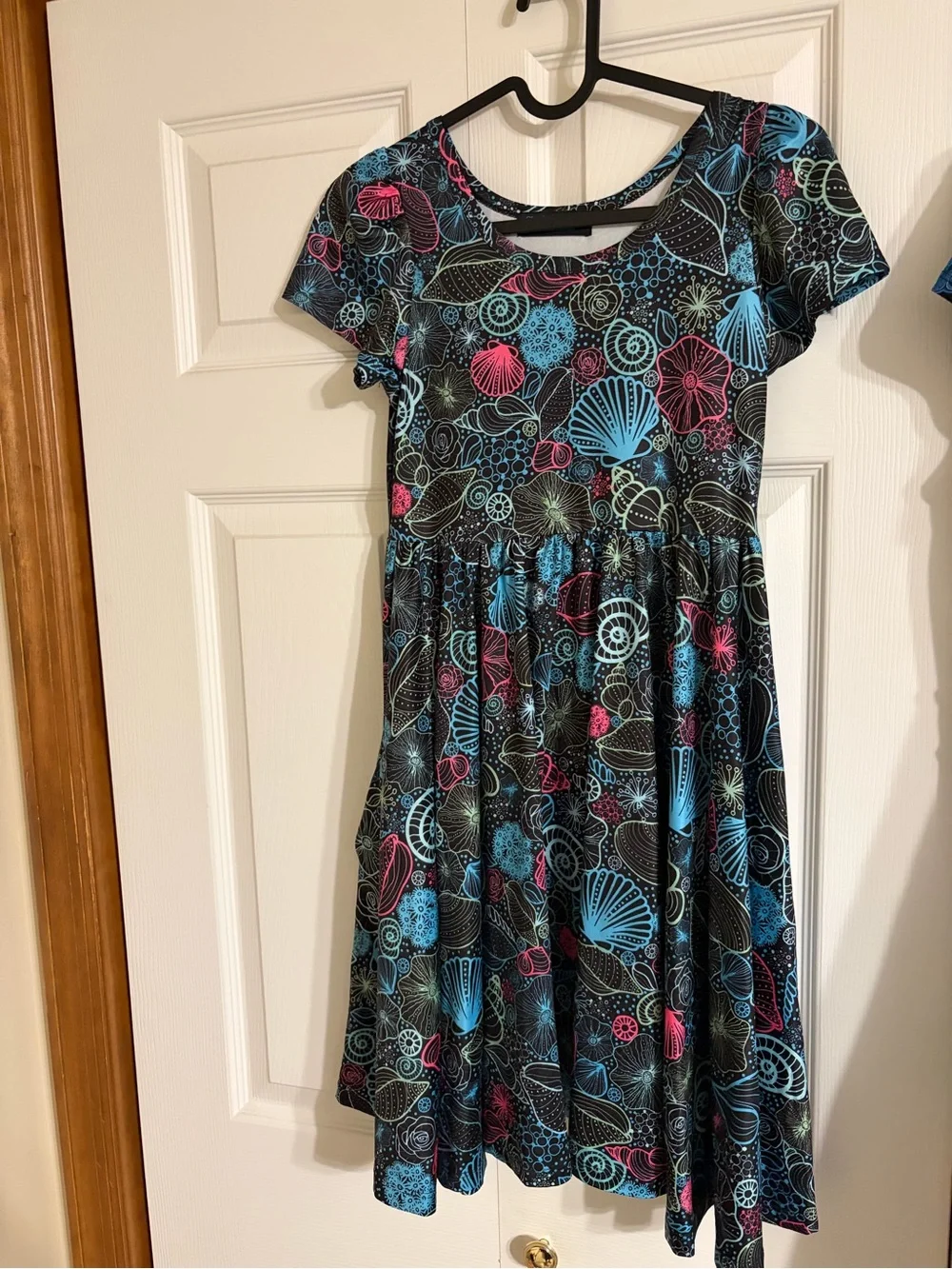 Charlie’s Project Girls Black Seashell Print Dress with Blue and Pink Accents
